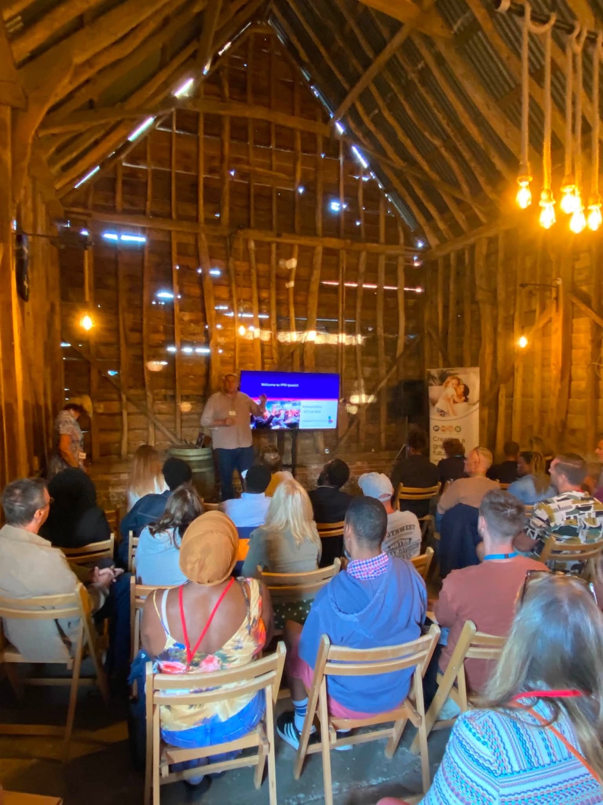 Networking presentation in the Barn at Flint Hall